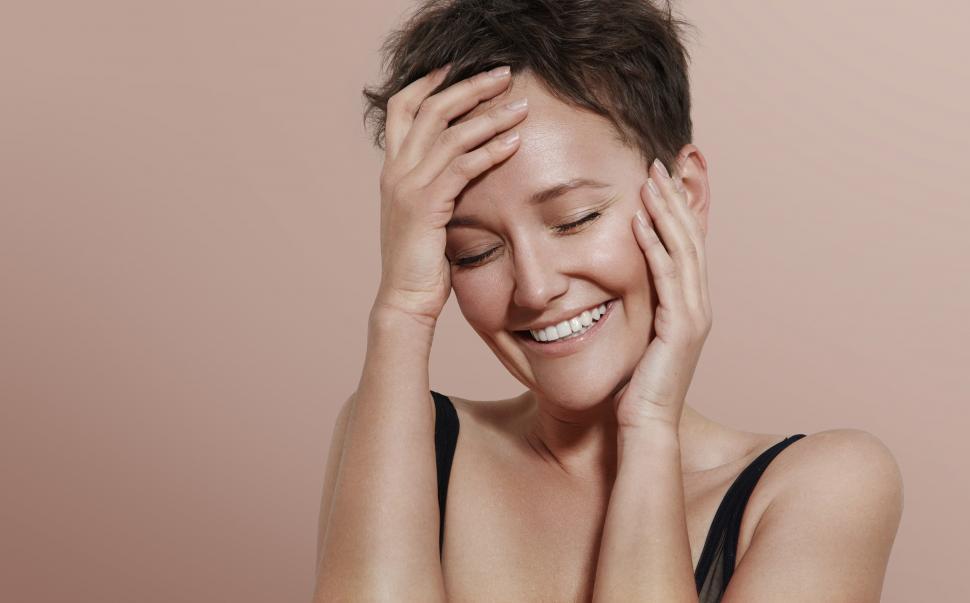 Free Image of happy smiling young woman with short haircut 