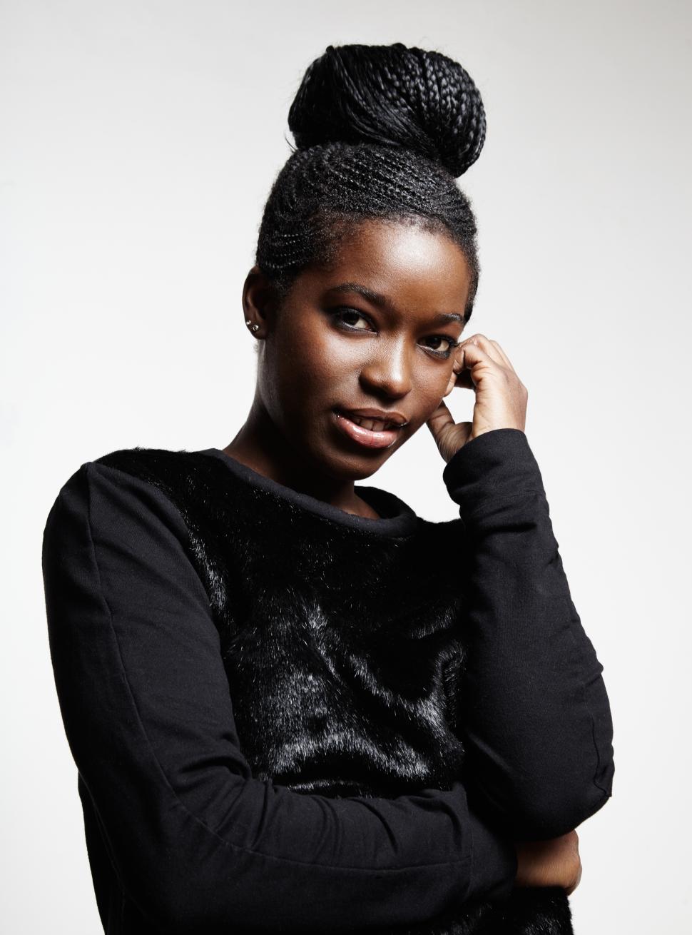 Free Image of black woman with a bun of braided hair 