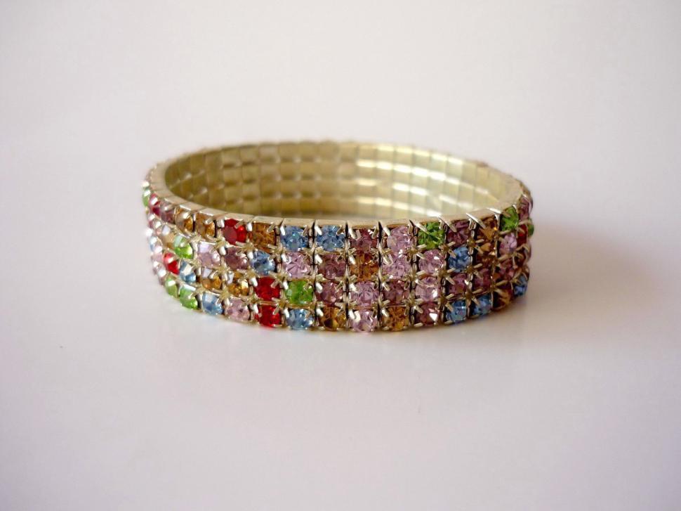 Free Image of Gold Ring With Multicolored Stones 