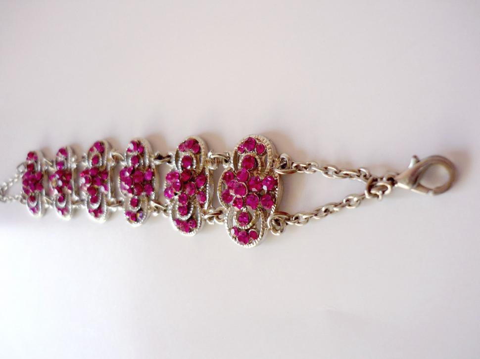 Free Image of Silver Bracelet With Pink Stones 