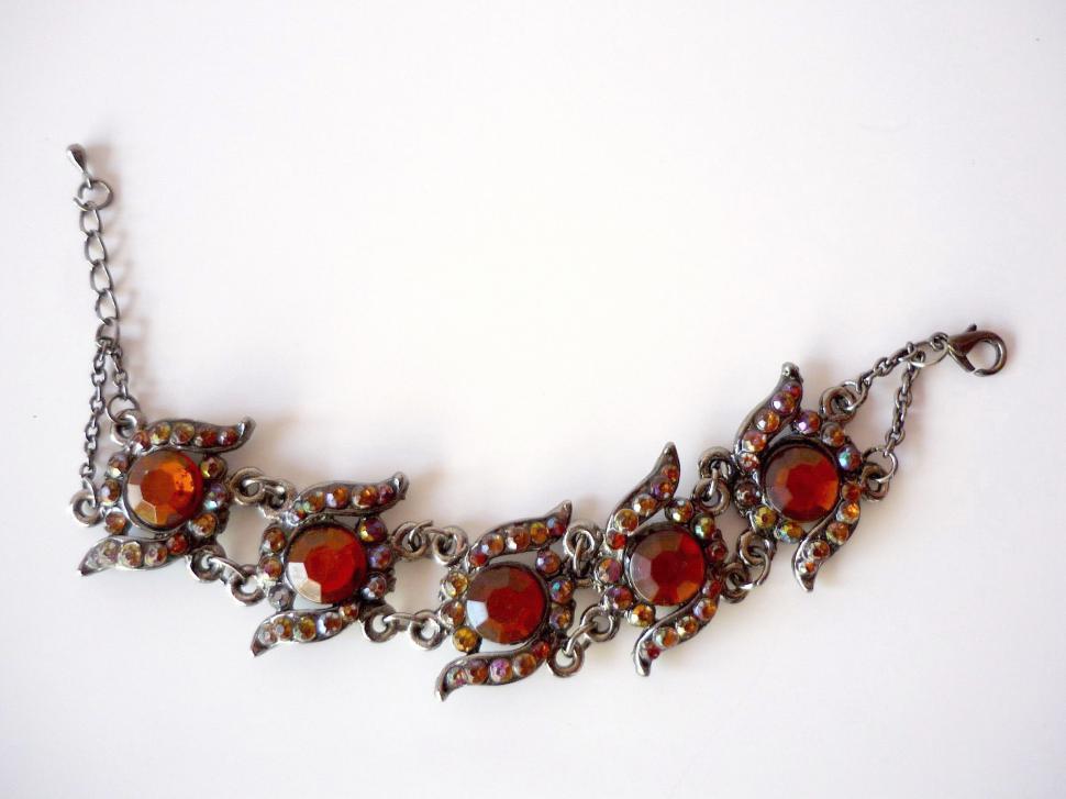 Free Image of Necklace With Red Stones on Chain 