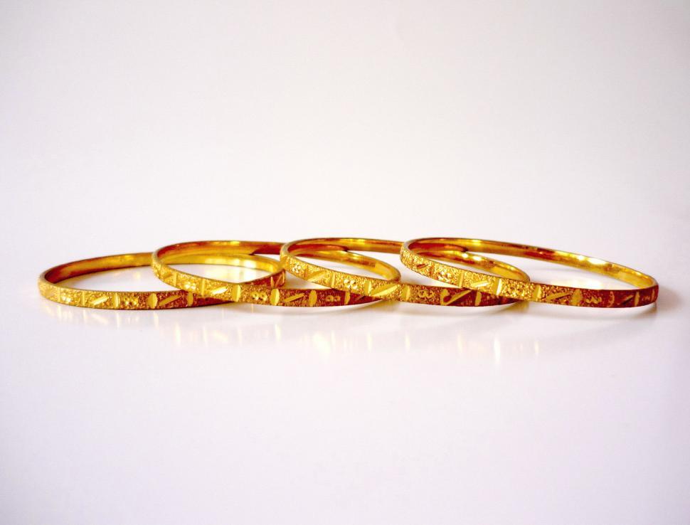 Free Image of Group of Gold Rings on White Table 