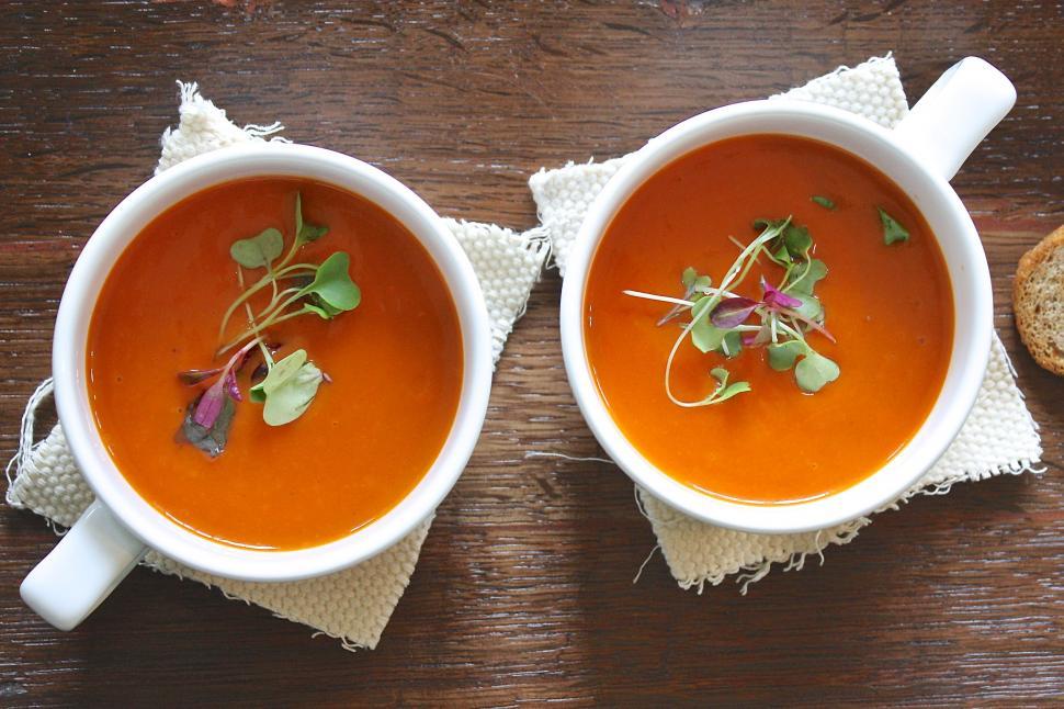Free Image of Two bowls of soup on napkins 