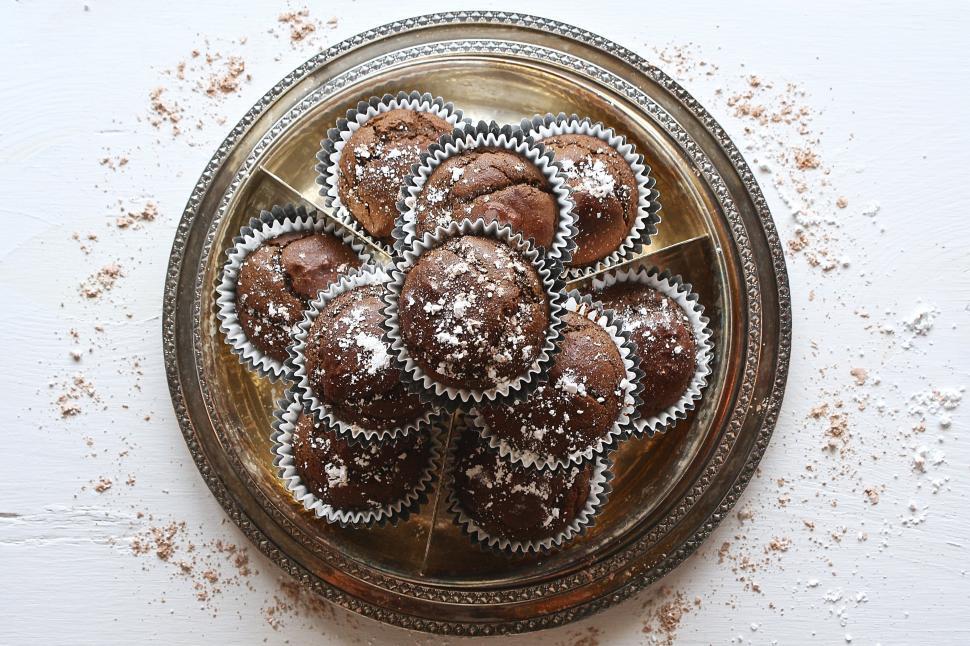 Free Image of A group of chocolate muffins on a silver plate 