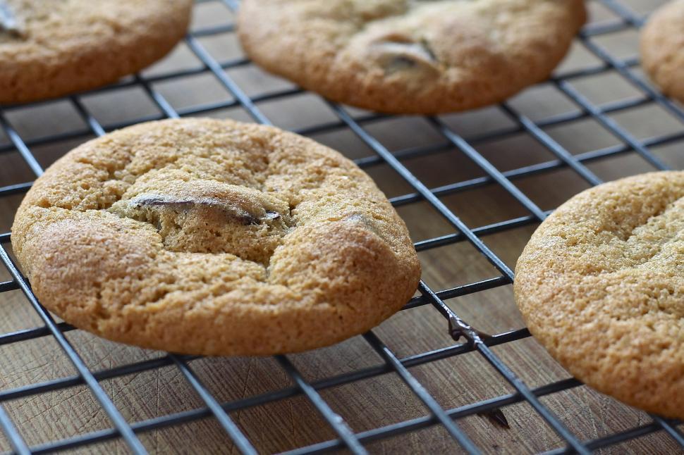 Free Image of A group of cookies on a cooling rack 