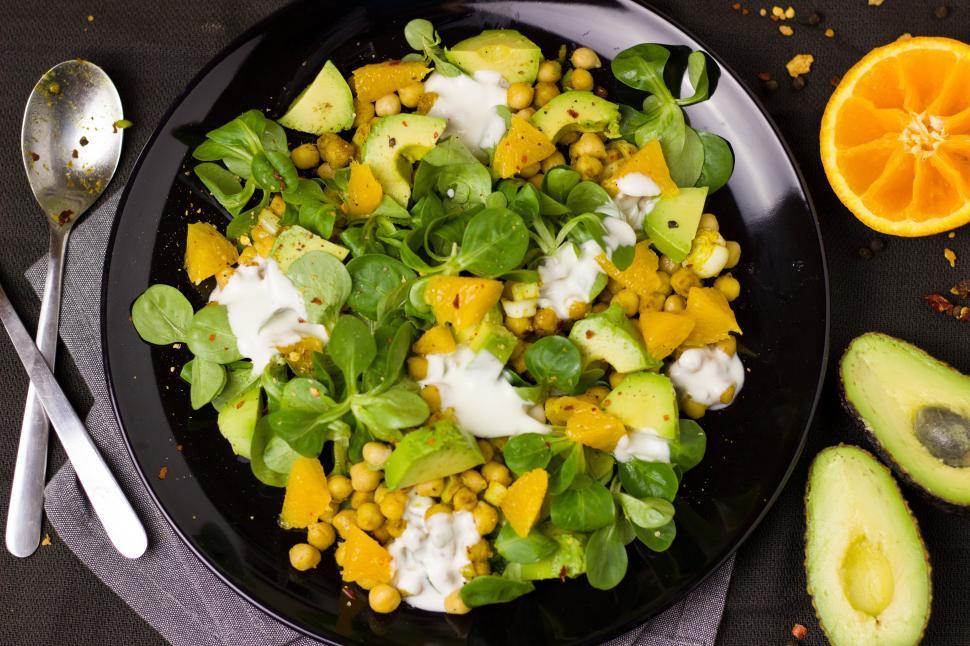 Free Image of A plate of salad with oranges and avocado 