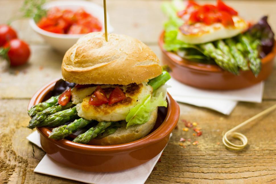 Free Image of A burger with asparagus and tomatoes in a bowl 