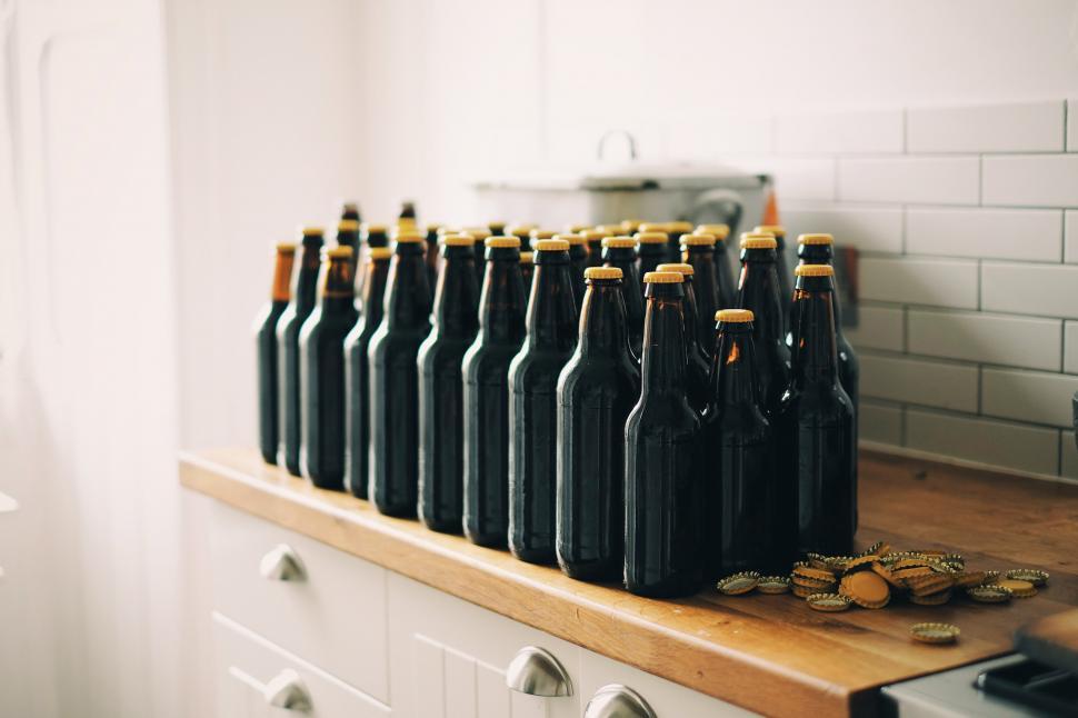 Free Image of A group of bottles on a counter 