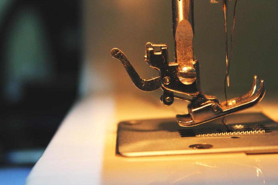 Free Image of A close up of a sewing machine foot 