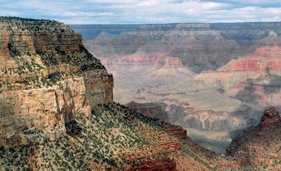 Free Image of A large canyon with a valley below 