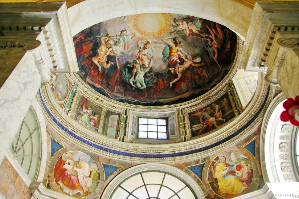 Free Image of A ceiling with paintings on the ceiling 