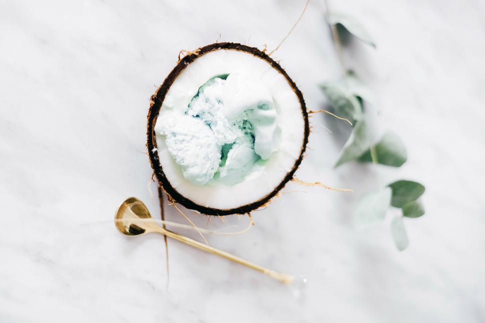 Free Image of A coconut with ice cream in it 