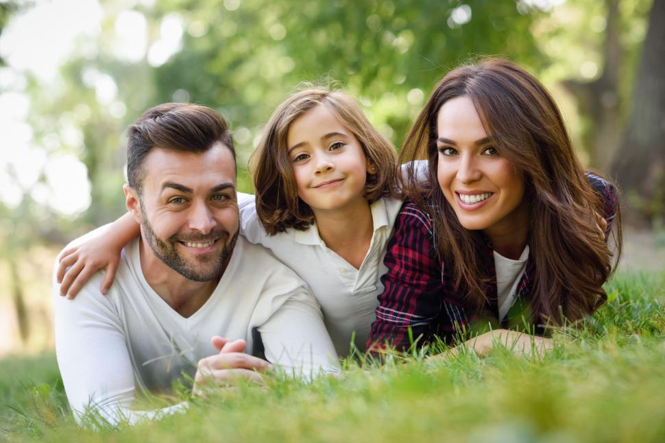 Free Image of Happy young family in a urban park 