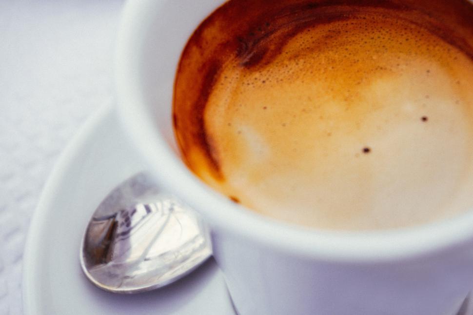 Free Image of A cup of coffee with a spoon 