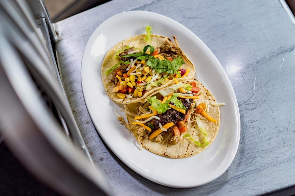 Free Image of A plate of tacos on a table 