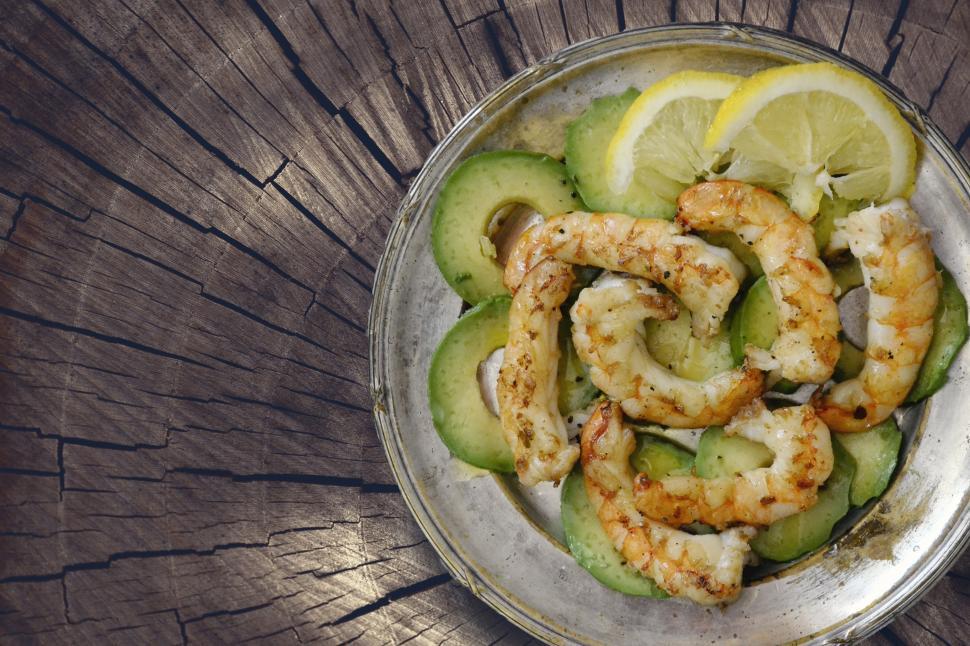Free Image of A plate of shrimp and avocado 