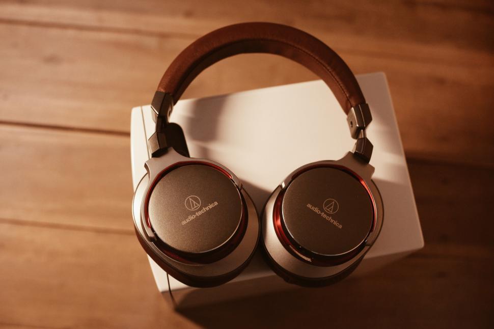Free Image of A pair of headphones on a white box 