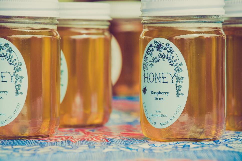 Free Image of A group of jars of honey 