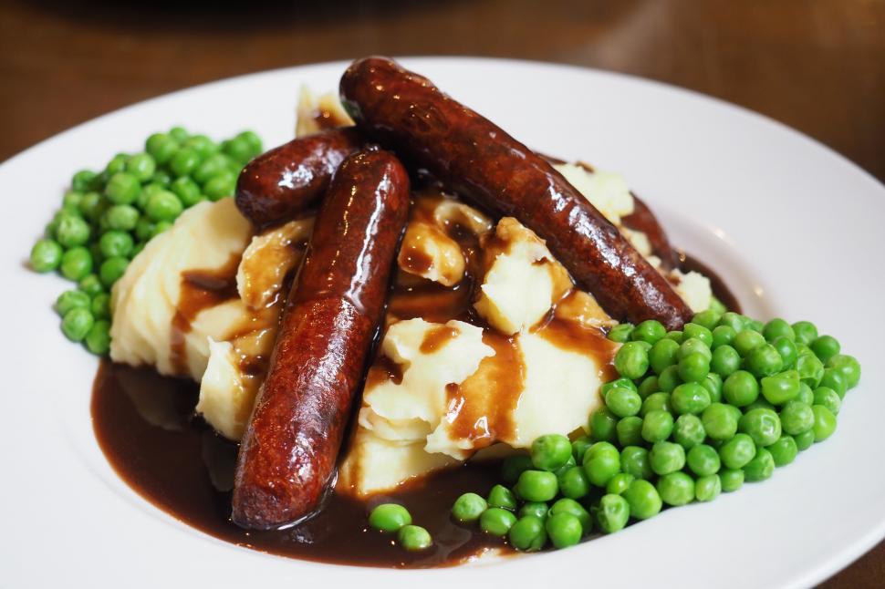 Free Image of A plate of food with sausages and mashed potatoes 
