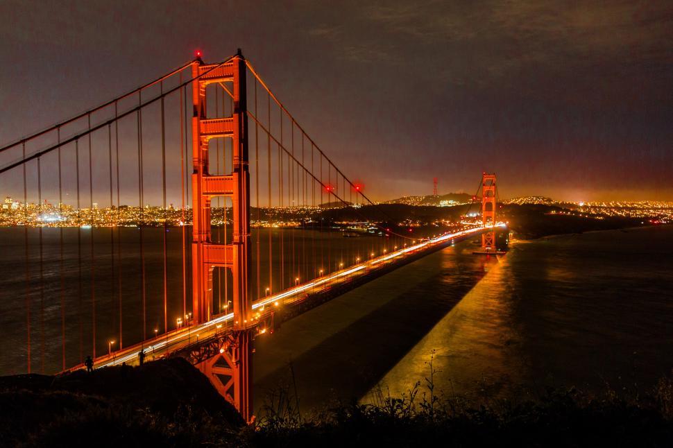 Free Image of Golden gate bridge with lights on it 
