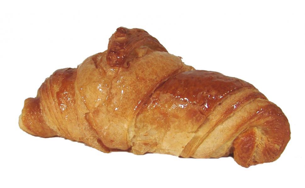 Free Image of Close Up of a Croissant on a White Background 