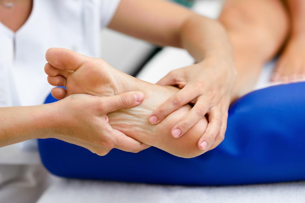 Free Image of Medical massage at the foot in a physiotherapy center. 