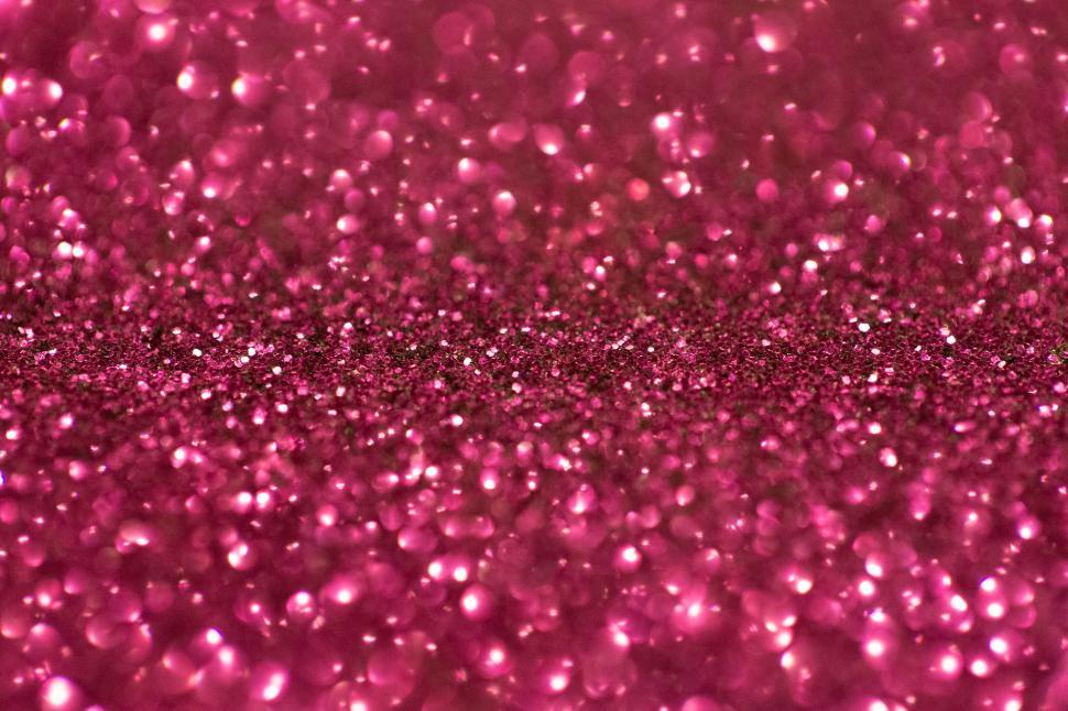 Free Image of A close up of a pink glitter 