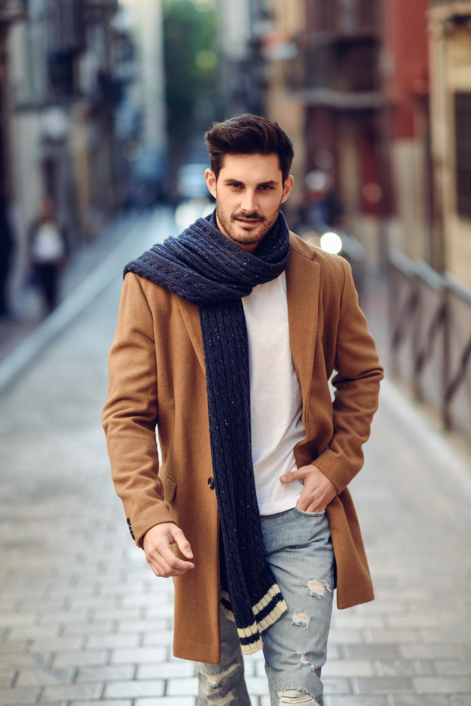 Free Image of Young man wearing winter clothes in the street. 