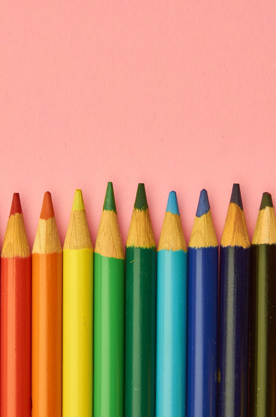 Free Image of A row of colored pencils 