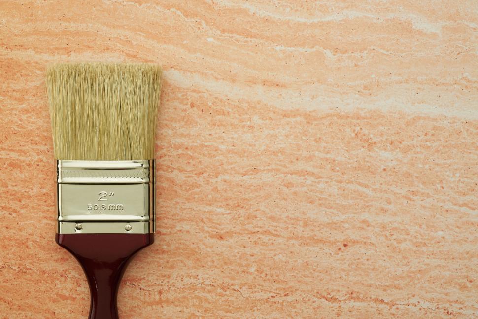 Free Image of A paint brush on a marbled surface 