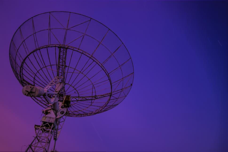 Free Image of A satellite dish on a tower 