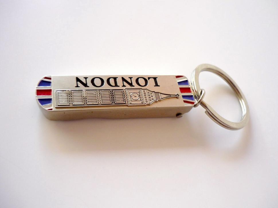 Free Image of Silver Key Chain With Red, White, and Blue Stripe 
