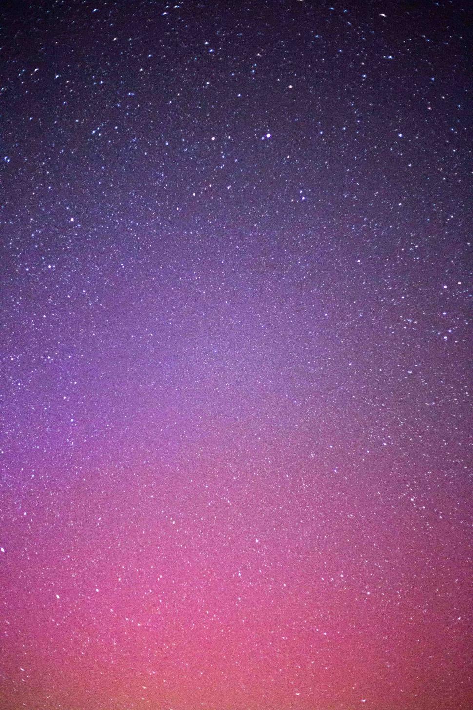 Free Image of A purple and pink starry sky 
