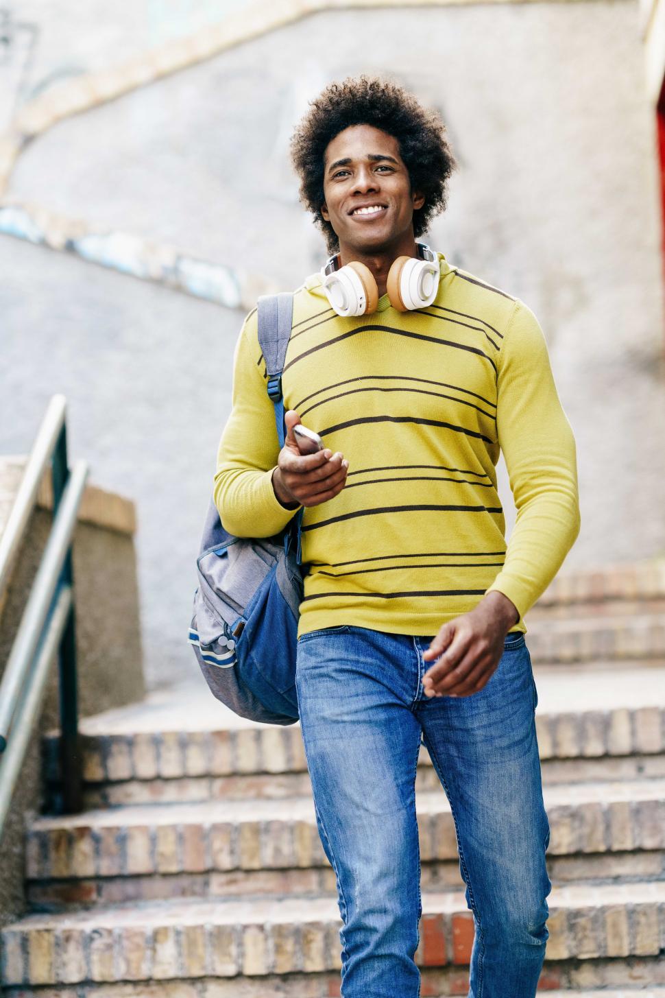 Free Image of Black man with afro hair sightseeing in Granada 