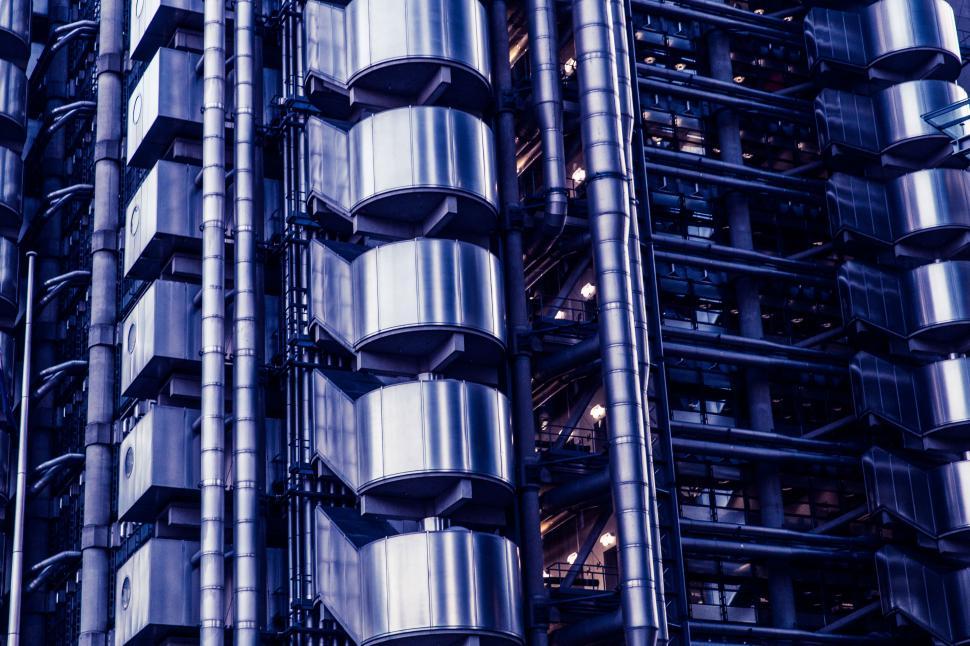 Free Image of A metal building with multiple metal pipes 