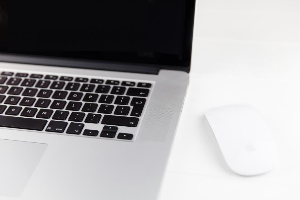 Free Image of A laptop computer and mouse 