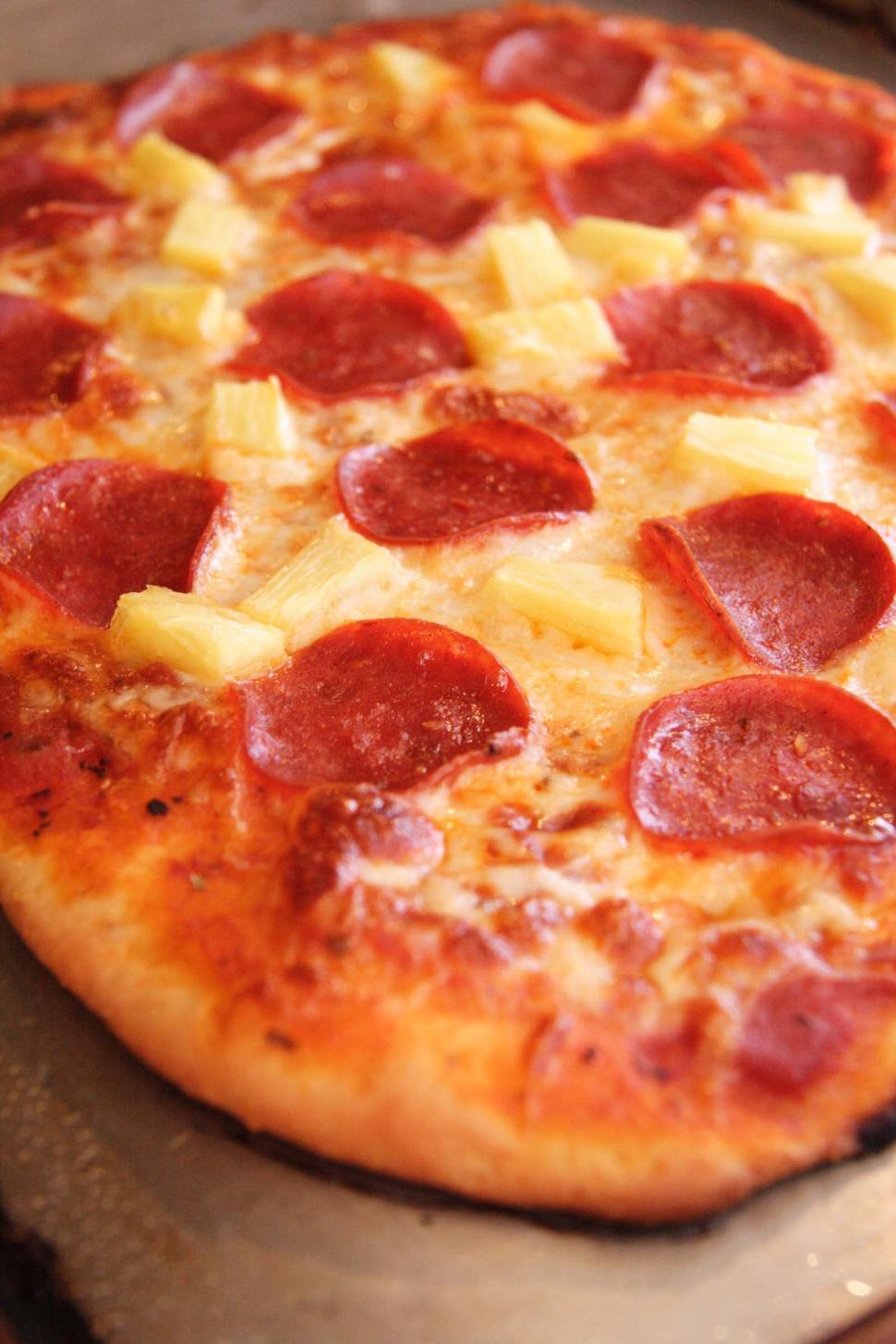 Download Free Stock Photo of Pizza with pineapple and pepperoni 