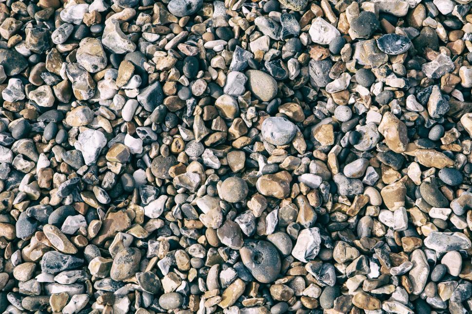 Free Image of A group of rocks on the ground 