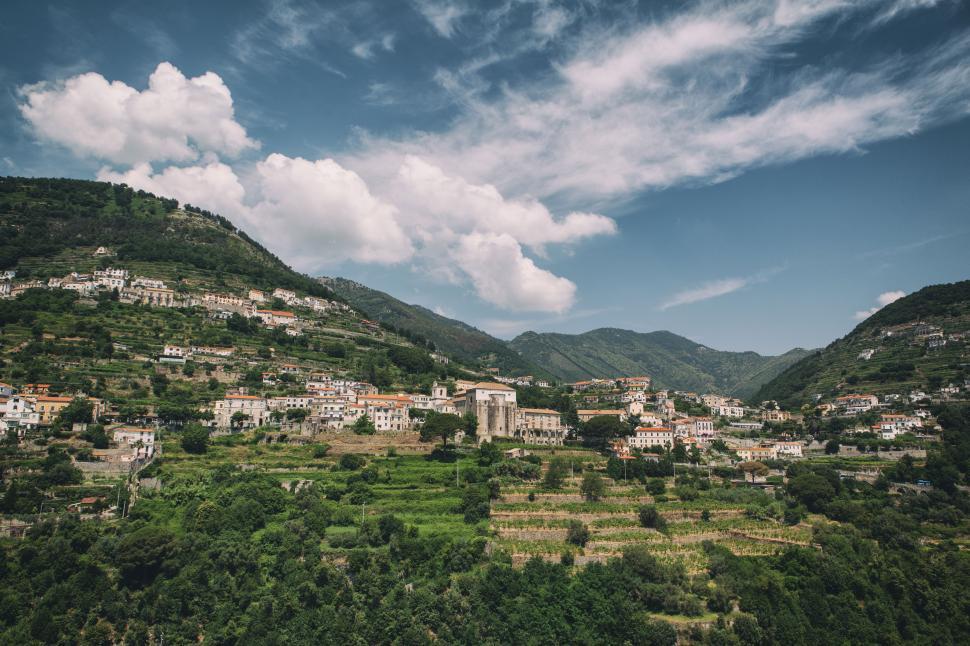 Free Image of A landscape of a town on a hill 