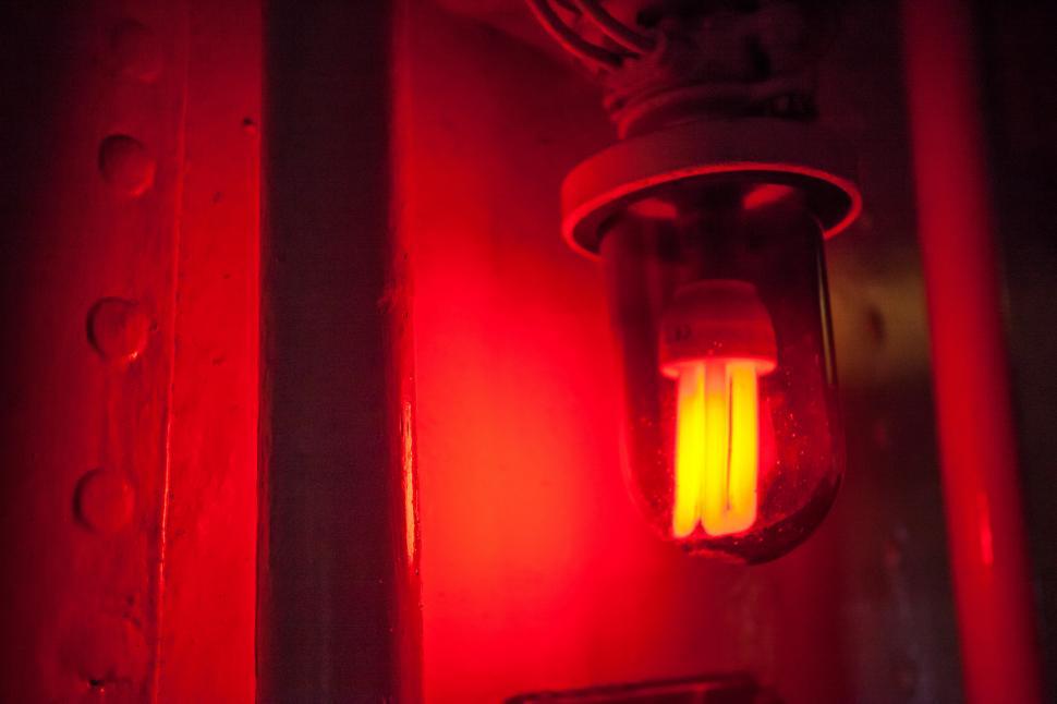 Free Image of A light bulb with a red light 