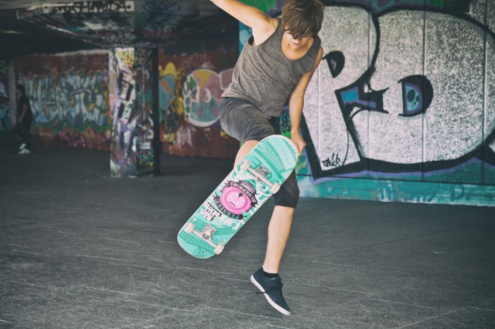 Free Image of A person doing a trick on a skateboard 