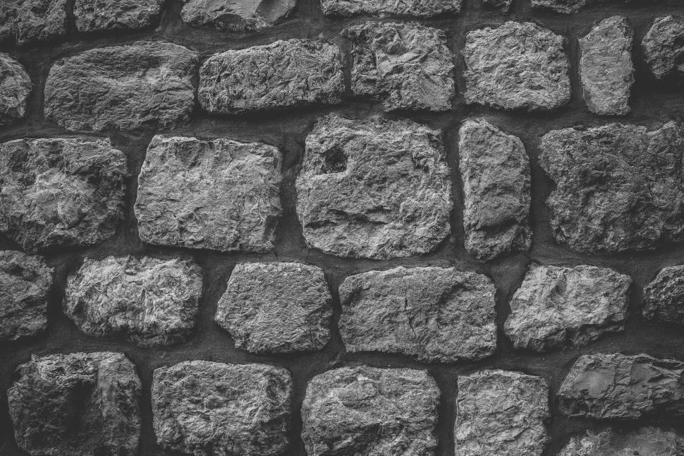 Free Image of A close up of a stone wall 