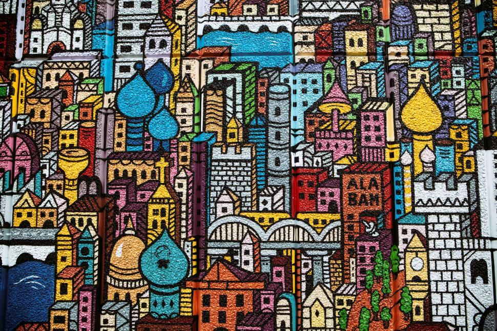 Free Image of A colorful city painting on a wall 