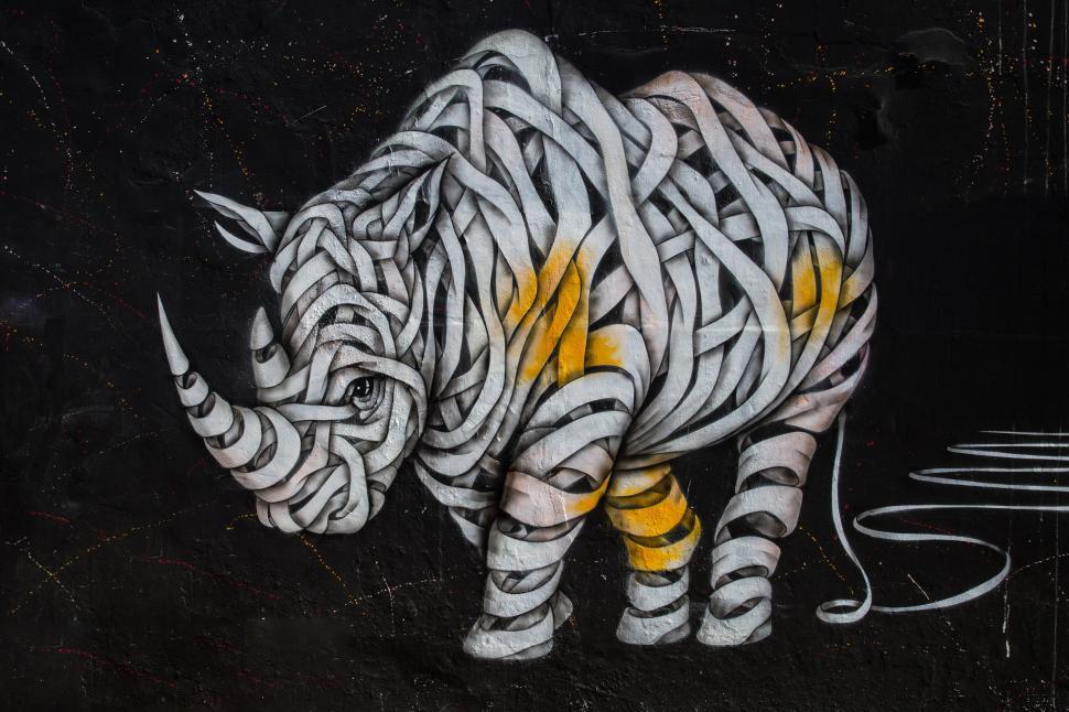 Free Image of A graffiti painting of a rhinoceros 