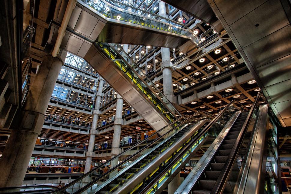 Free Image of A large building with multiple escalators 