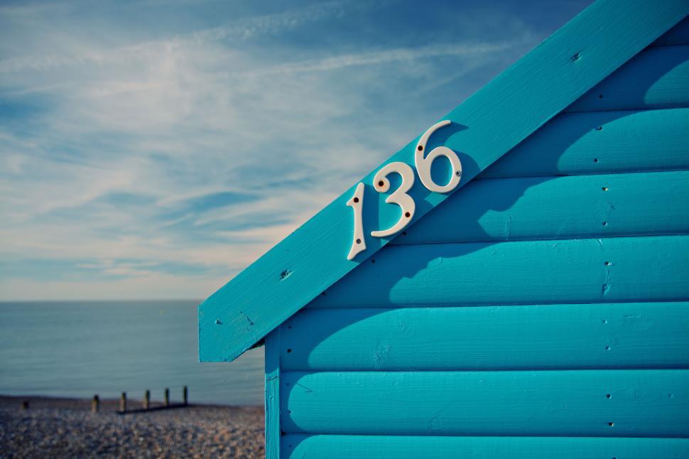 Free Image of A blue house with numbers on it 