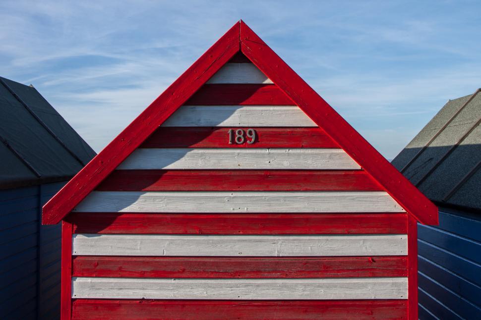 Free Image of A red and white striped building 
