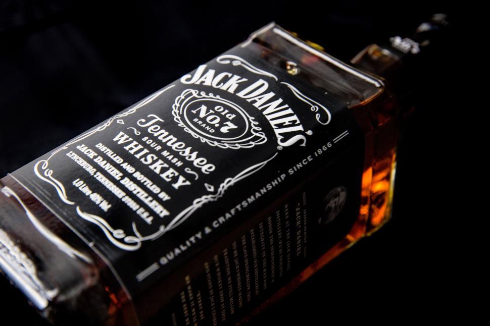Free Image of A bottle of whiskey with a black label 