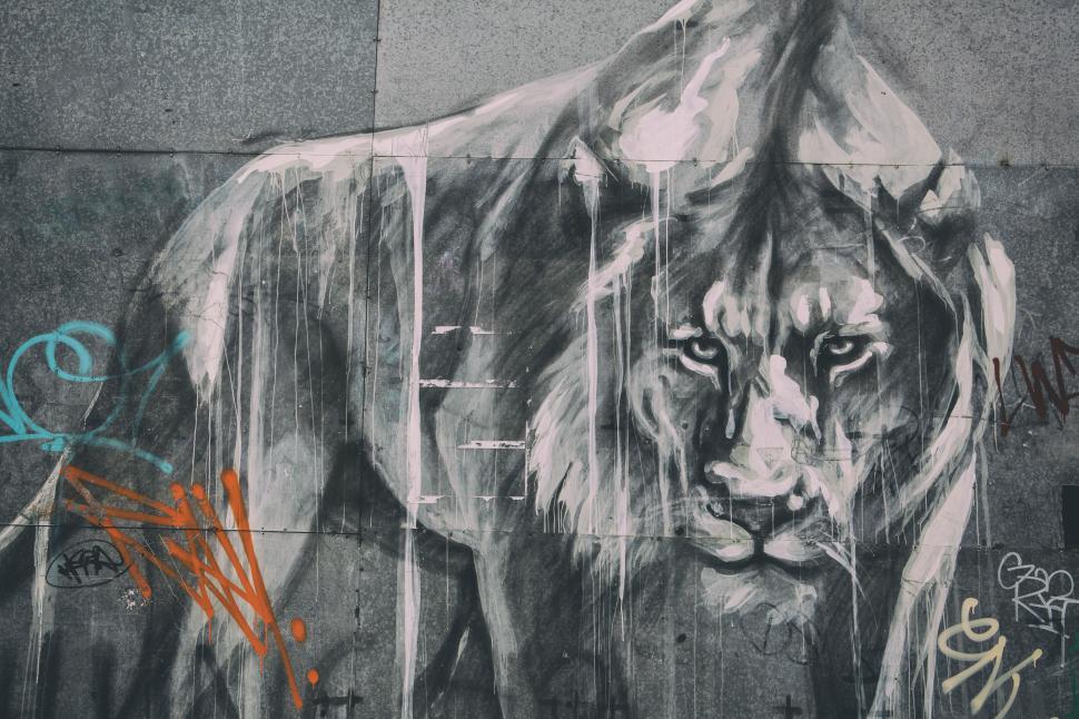 Free Image of A lion painted on a wall 