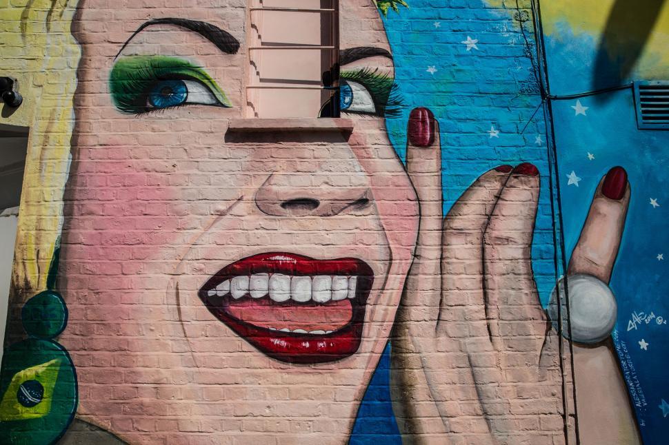 Free Image of A mural of a woman s face 